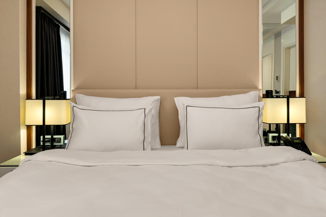 Gleam Collection Hotel Istanbul Exterior photo A bed with two pillows